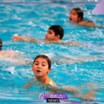 تفسير حلم السباحة في المسبح مع أشخاص اعرفهم في المنام لابن سيرين